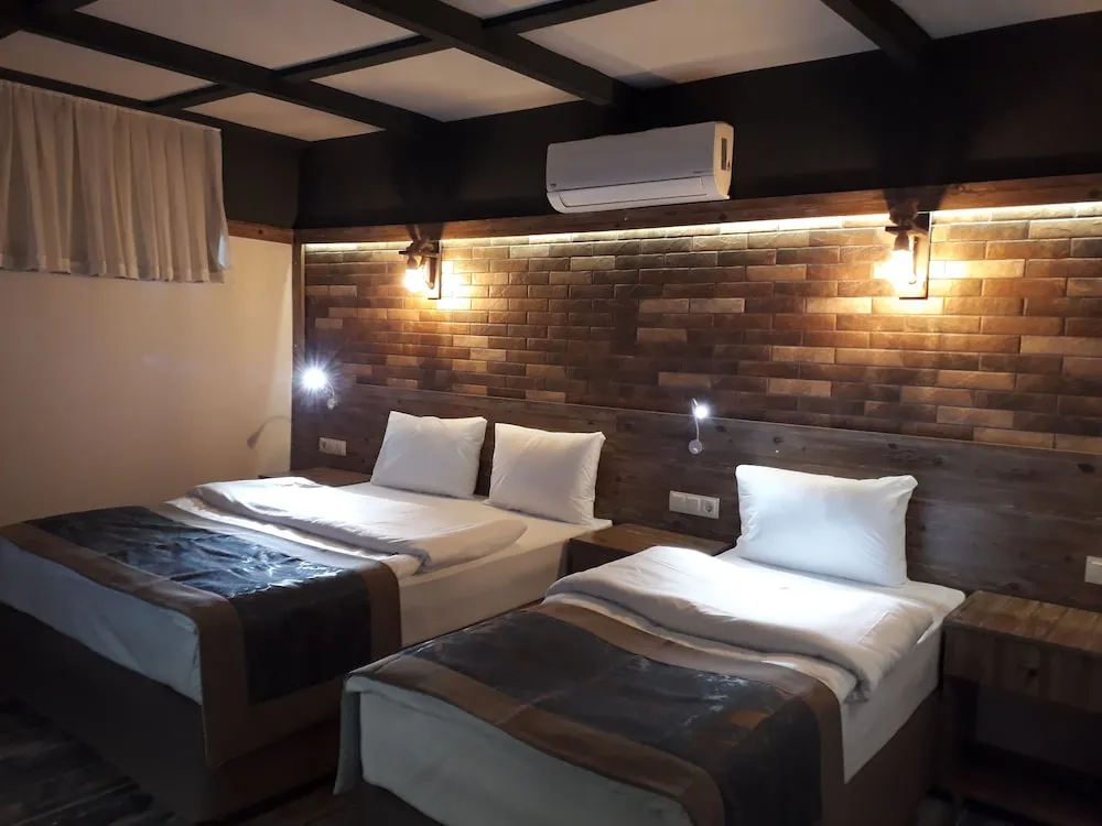 Deluxe Tek Büyük veya İki Ayrı Yataklı Oda