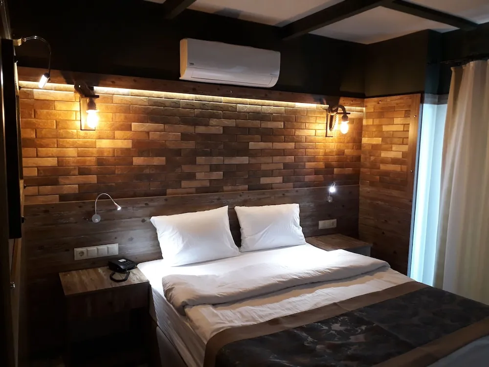 Deluxe Tek Büyük veya İki Ayrı Yataklı Oda