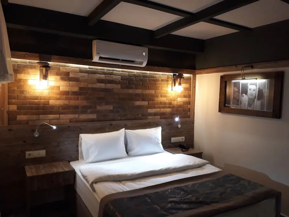 Deluxe Tek Büyük veya İki Ayrı Yataklı Oda