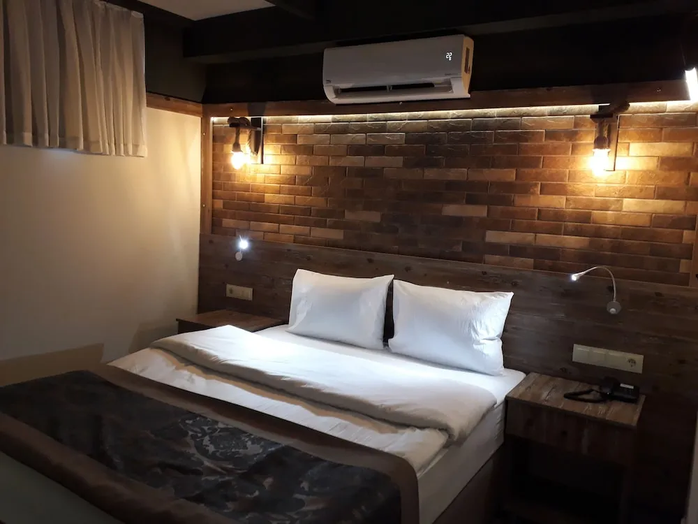 Deluxe Tek Büyük veya İki Ayrı Yataklı Oda