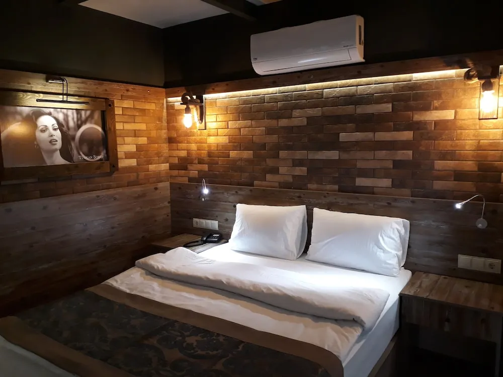Deluxe Tek Büyük veya İki Ayrı Yataklı Oda