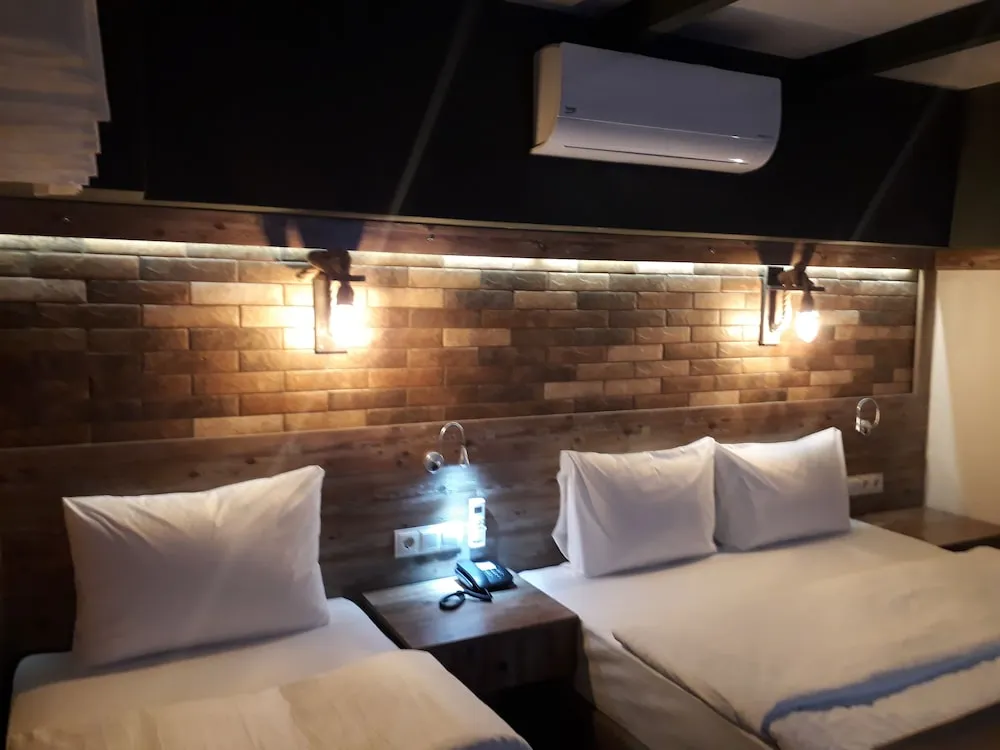 Deluxe Tek Büyük veya İki Ayrı Yataklı Oda