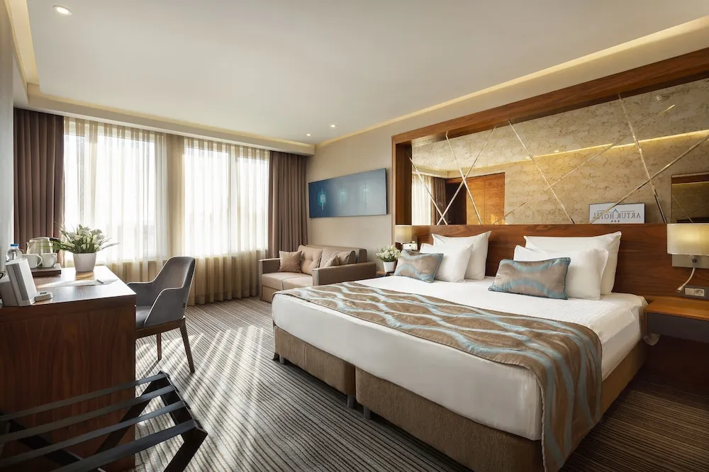 Corner Deluxe Double Room with Sofa and City View