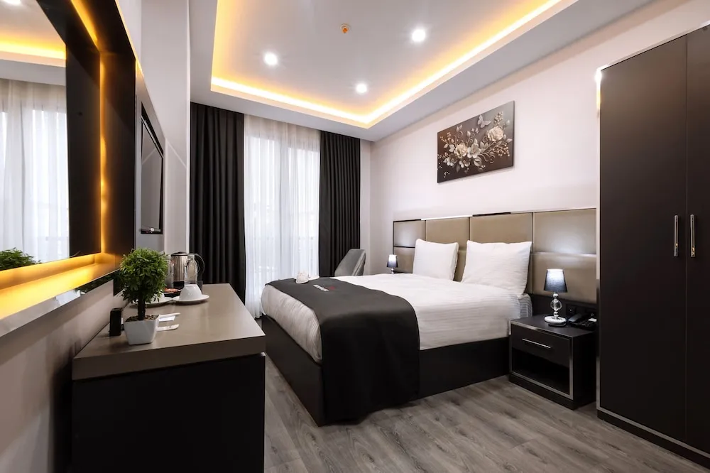 Deluxe Tek Büyük Yataklı Oda