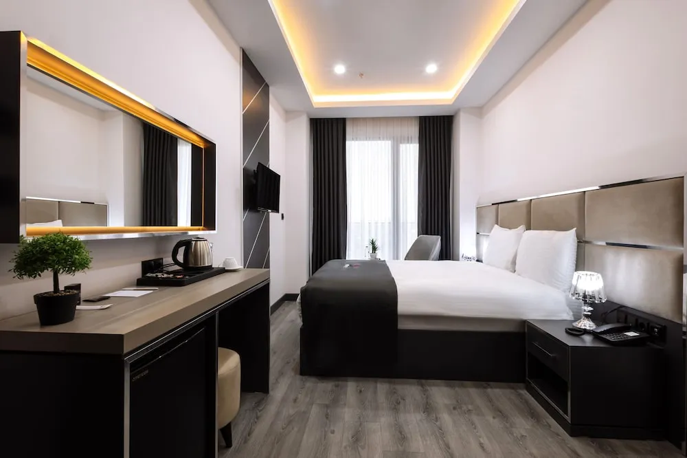 Deluxe Tek Büyük Yataklı Oda