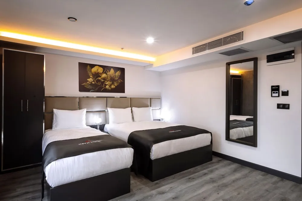 Deluxe Üç Kişilik Oda