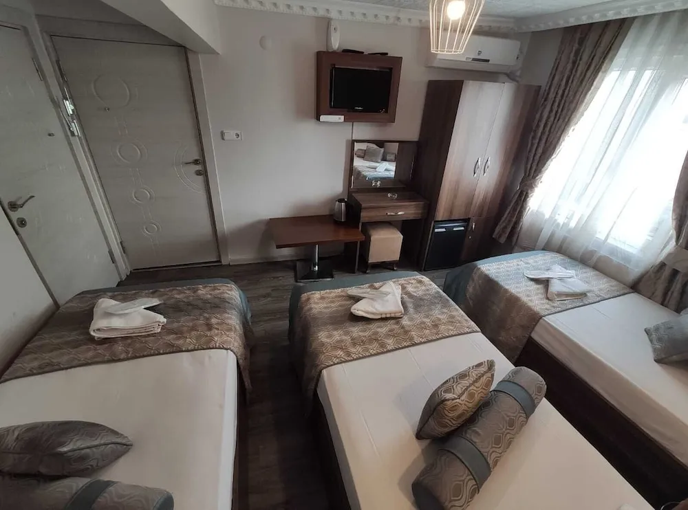 Deluxe Üç Kişilik Oda