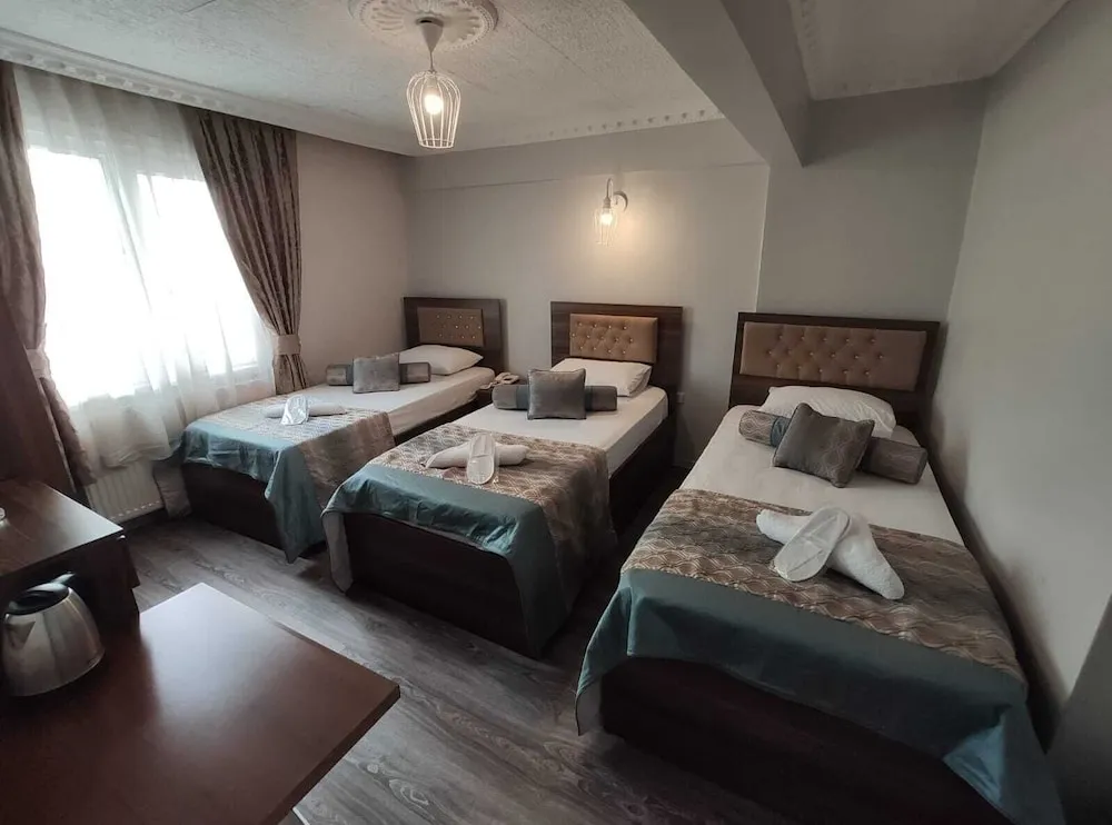 Deluxe Üç Kişilik Oda