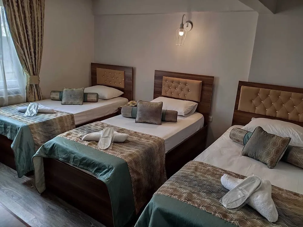 Deluxe Üç Kişilik Oda