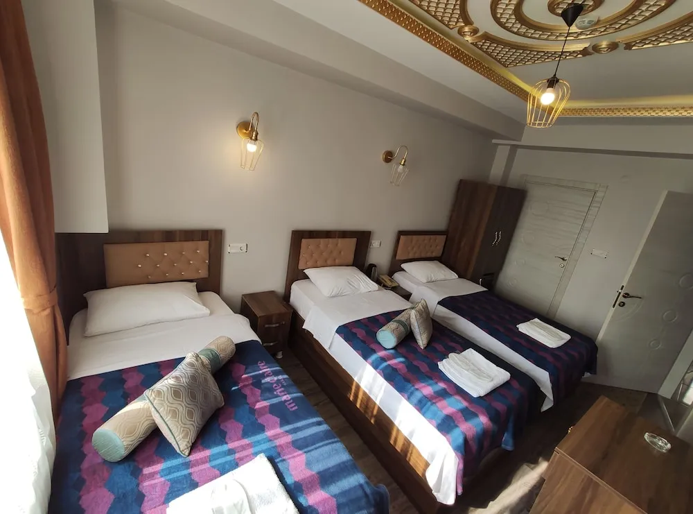 Deluxe Üç Kişilik Oda