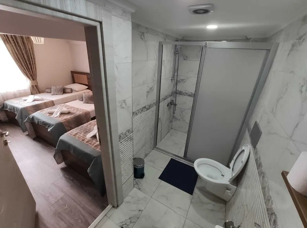Deluxe Üç Kişilik Oda