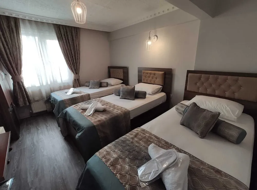 Deluxe Üç Kişilik Oda