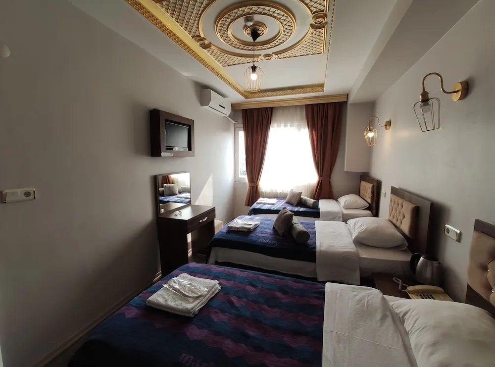 Deluxe Üç Kişilik Oda