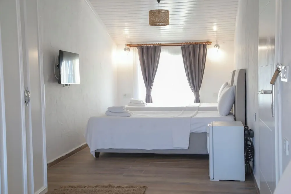 Deluxe Dört Kişilik Oda