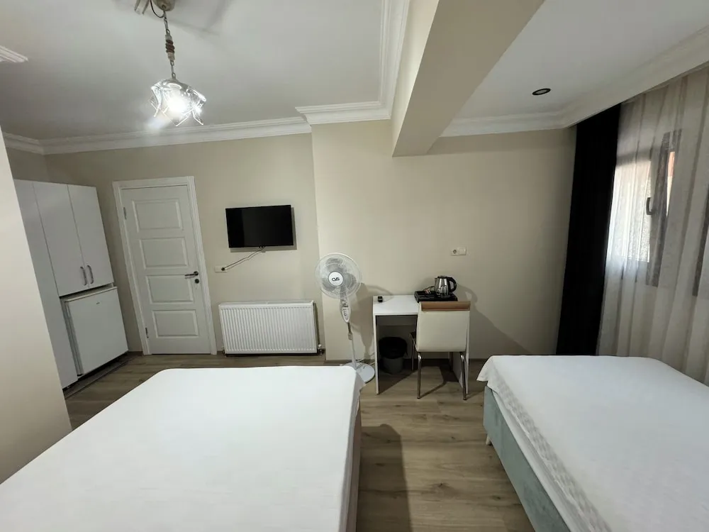 Family Tek Büyük veya İki Ayrı Yataklı Oda, Özel Banyo