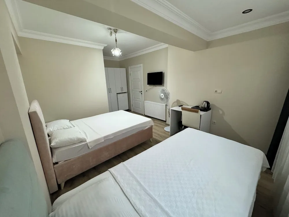Family Tek Büyük veya İki Ayrı Yataklı Oda, Özel Banyo