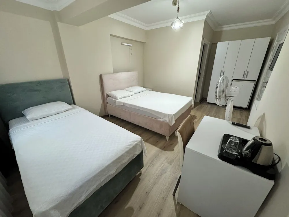 Family Tek Büyük veya İki Ayrı Yataklı Oda, Özel Banyo
