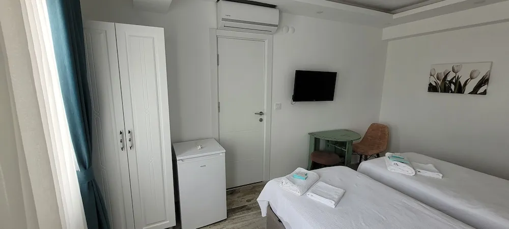 Deluxe Tek Büyük veya İki Ayrı Yataklı Oda