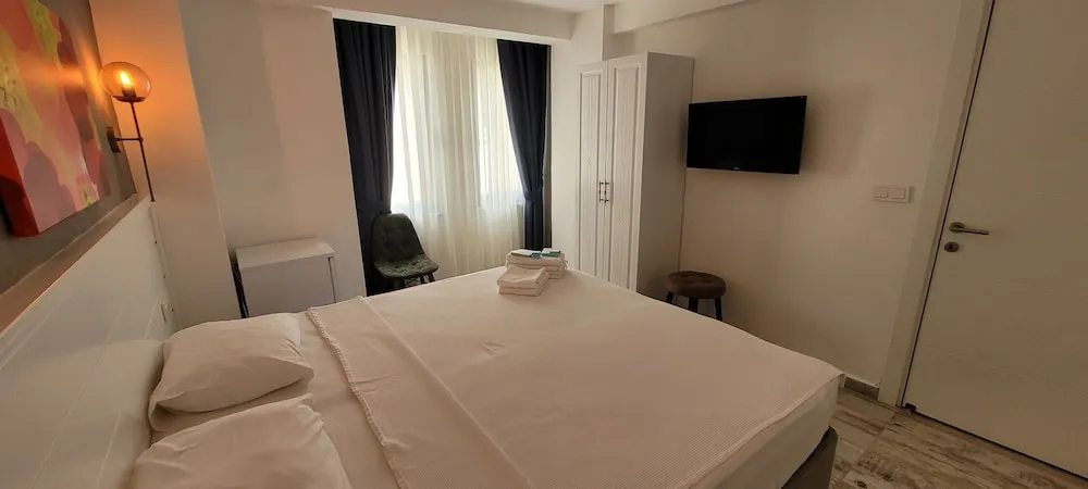 Deluxe Tek Büyük veya İki Ayrı Yataklı Oda