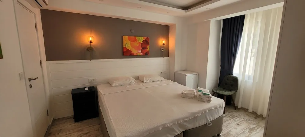 Deluxe Tek Büyük veya İki Ayrı Yataklı Oda