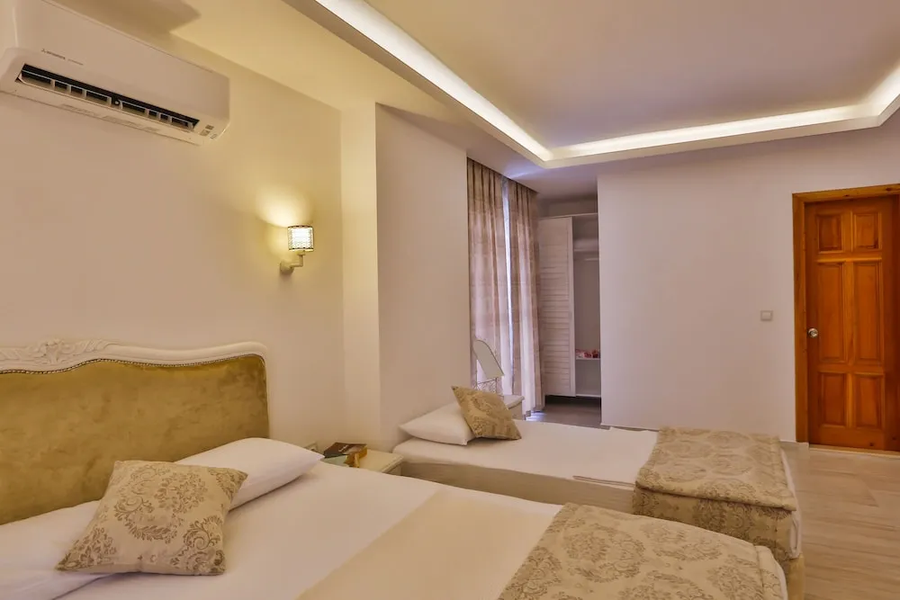 Deluxe Üç Kişilik Oda