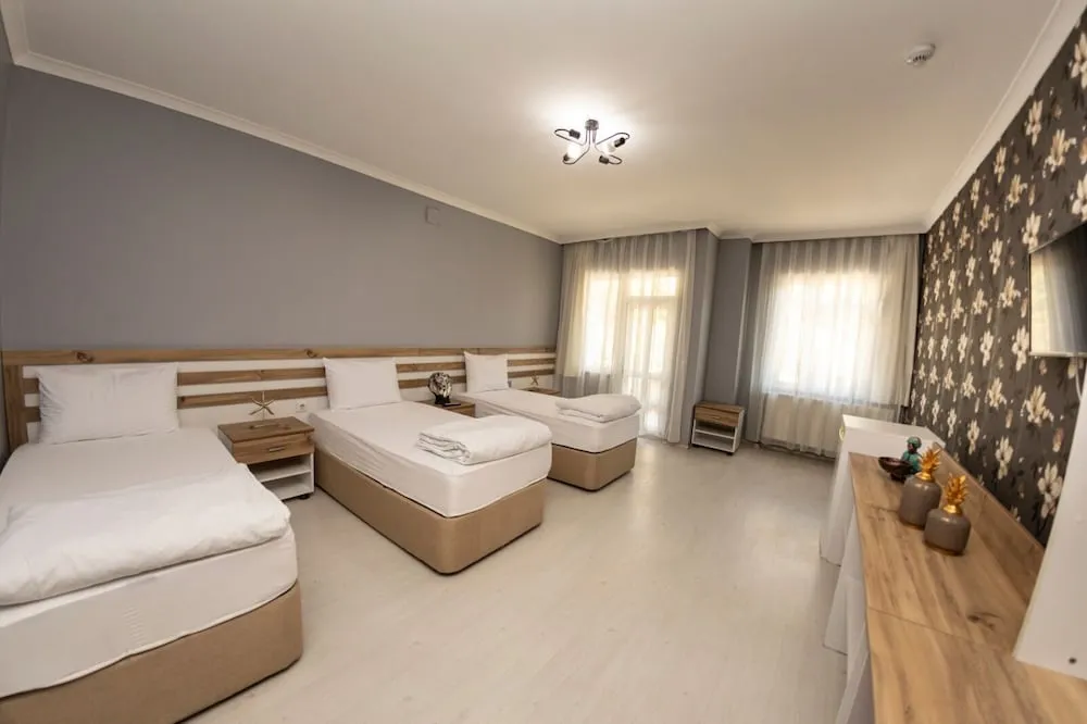 Economy Üç Kişilik Oda