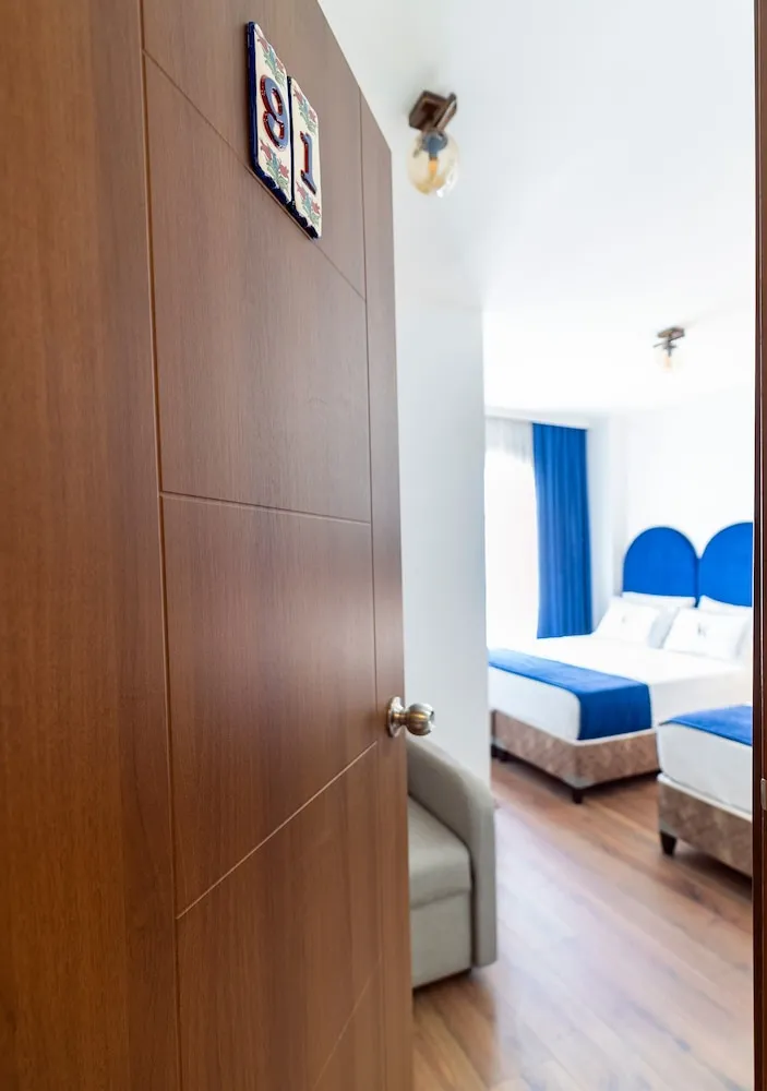 Deluxe Üç Kişilik Oda