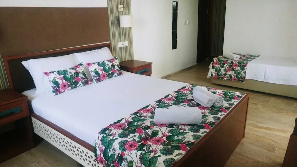 Family Üç Kişilik Oda, Birden Çok Yatak, Bahçe Manzaralı