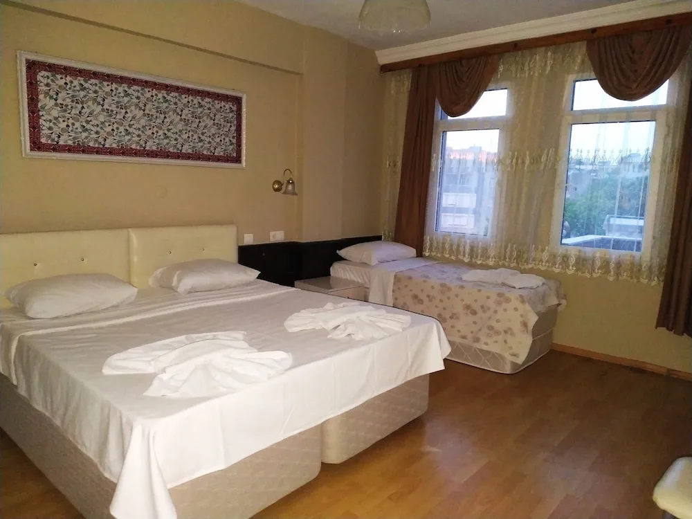 Deluxe Üç Kişilik Oda