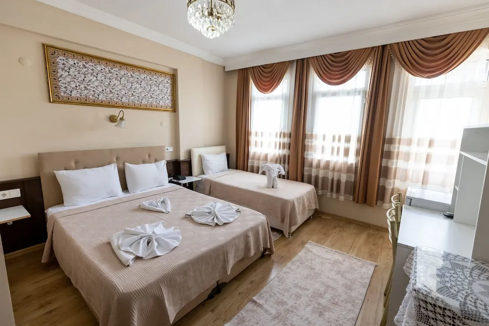 Deluxe Üç Kişilik Oda