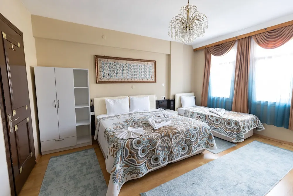 Deluxe Üç Kişilik Oda