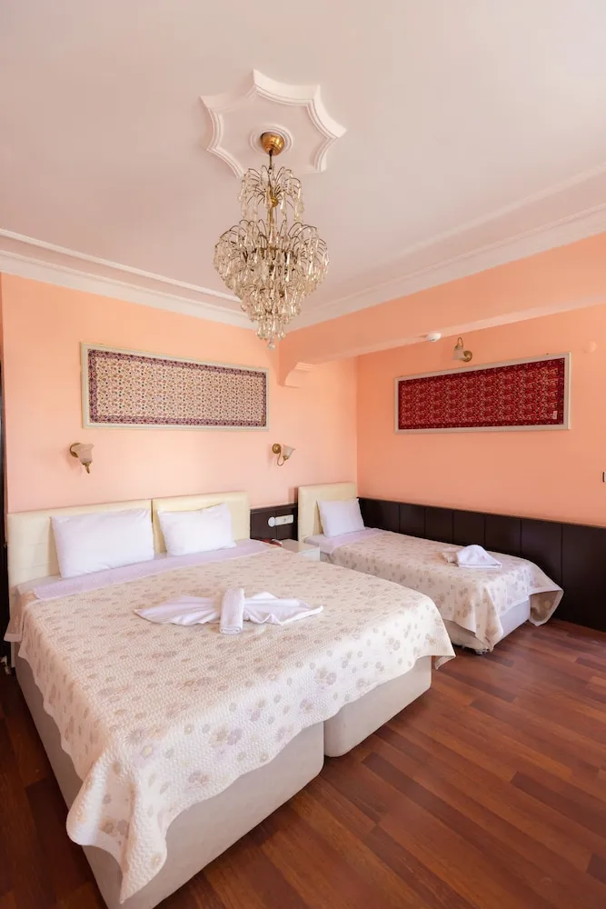 Deluxe Üç Kişilik Oda