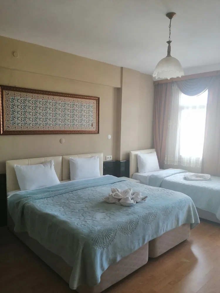 Deluxe Üç Kişilik Oda