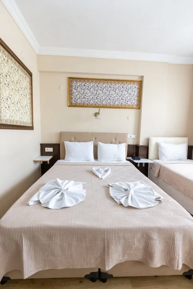 Deluxe Üç Kişilik Oda