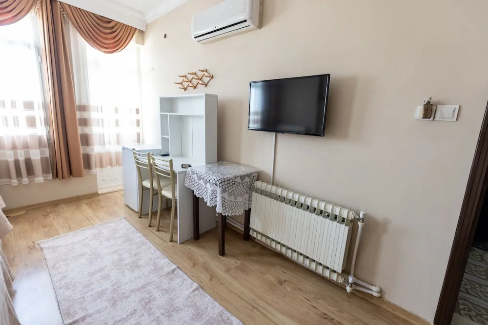 Deluxe Üç Kişilik Oda