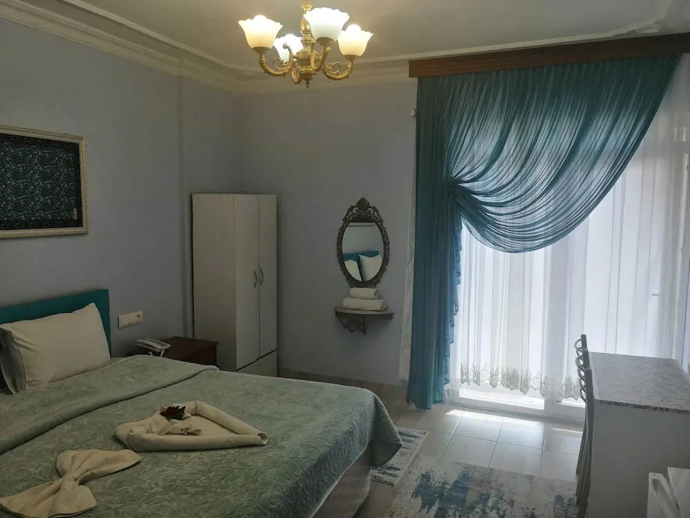 Exclusive Tek Büyük Yataklı Oda