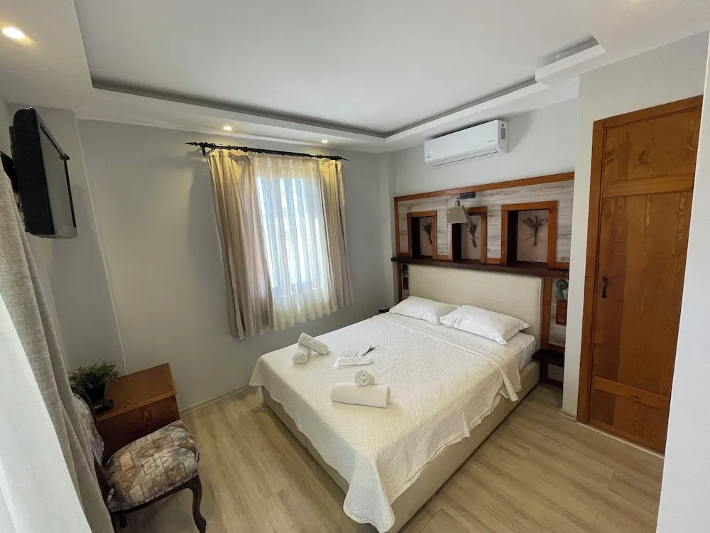 Family Dört Kişilik Oda, 1 Yatak Odası, Bahçe Manzaralı