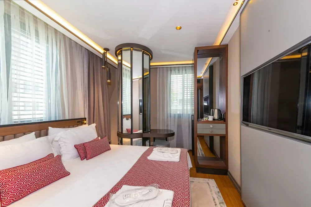 Deluxe Tek Büyük veya İki Ayrı Yataklı Oda