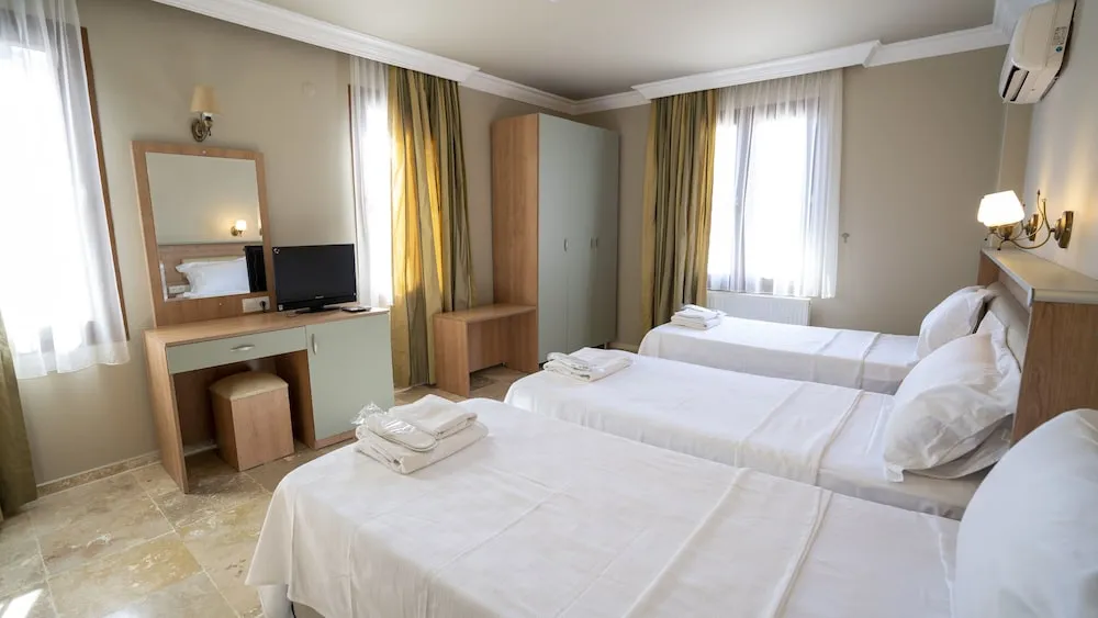 Deluxe Üç Kişilik Oda