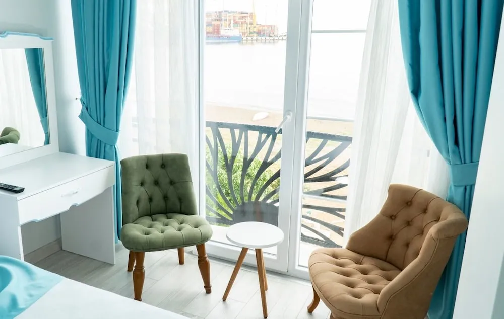 Deluxe Tek Büyük veya İki Ayrı Yataklı Oda