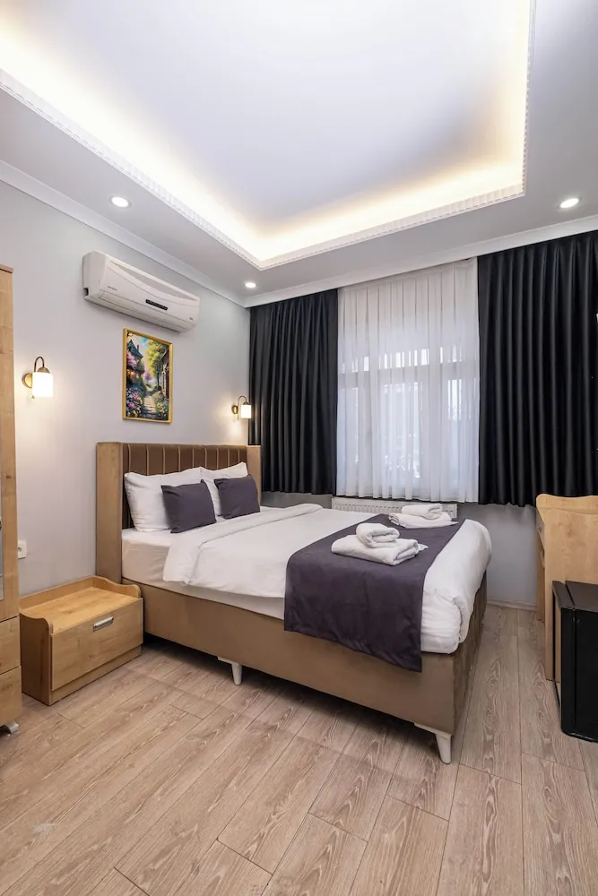 Deluxe Tek Büyük Yataklı Oda