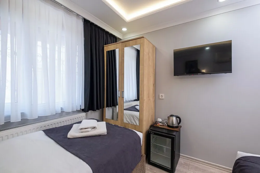 Deluxe Üç Kişilik Oda