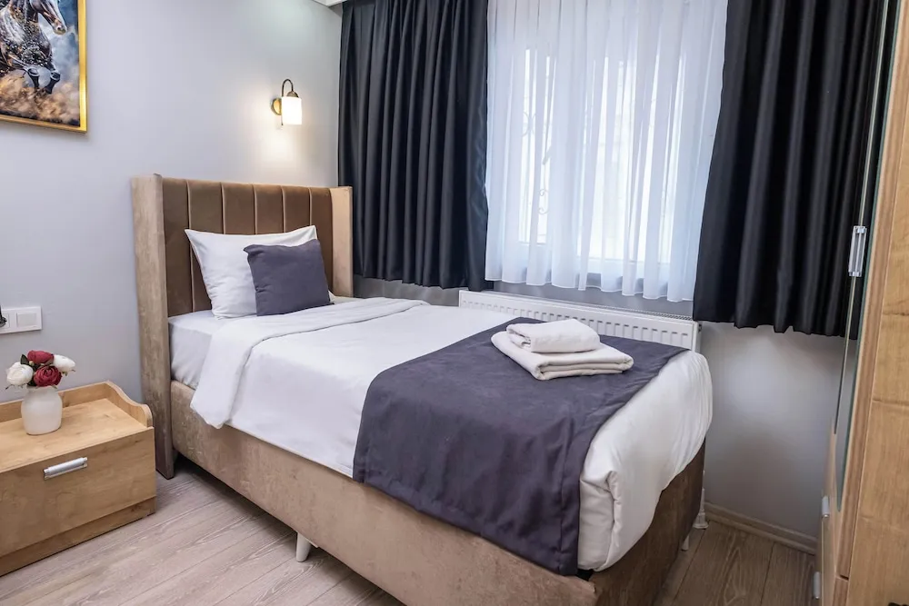 Deluxe Üç Kişilik Oda