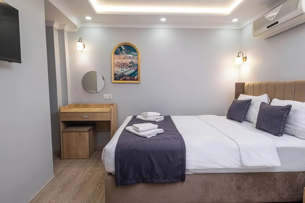 Deluxe Üç Kişilik Oda