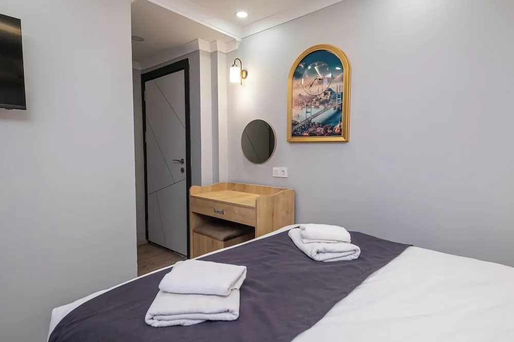 Deluxe Üç Kişilik Oda