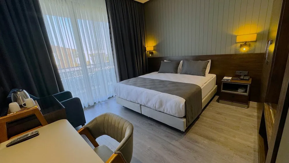 Deluxe Tek Büyük veya İki Ayrı Yataklı Oda
