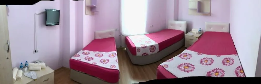 Üç Kişilik Oda