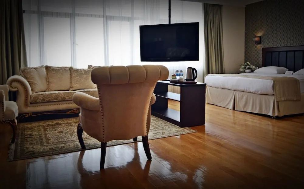 Deluxe Tek Büyük veya İki Ayrı Yataklı Oda