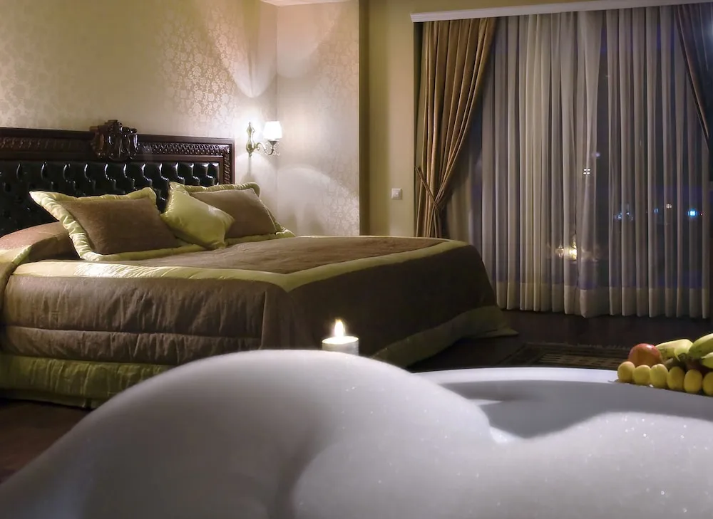Deluxe Tek Büyük veya İki Ayrı Yataklı Oda