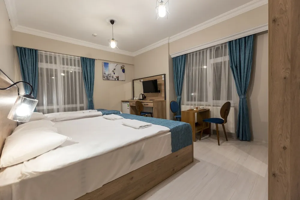 Luxury Üç Kişilik Oda